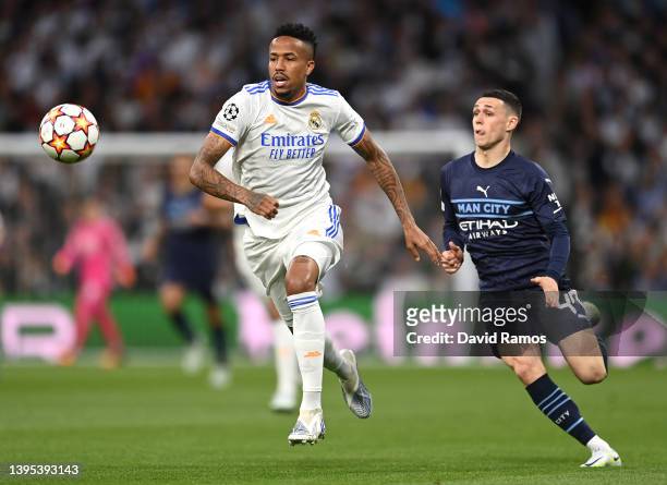Eder Militao of Real Madrid battles for possession with Phil Foden of Manchester City during the UEFA Champions League Semi Final Leg Two match...