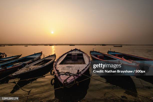 scenic view of sea against sky during sunset,varanasi,uttar pradesh,india - uttar pradesh - fotografias e filmes do acervo