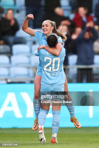 Georgia Stanway of Manchester City celebrates with team mate Lucy Bronze after scoring their sides first goal during the Barclays FA Women's Super...