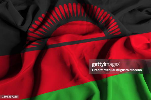 flag of malawi - malawi fotografías e imágenes de stock