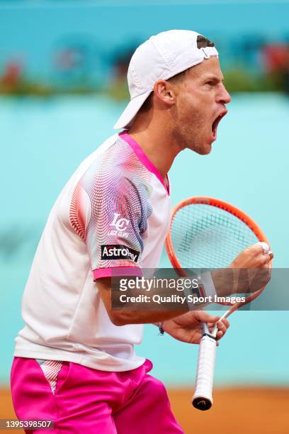 Diego Schwartzman of Argentina of Argentina celebrates a point against Grigor Dimitrov of Bulgaria during their Men's Singles match on Day Seven of...