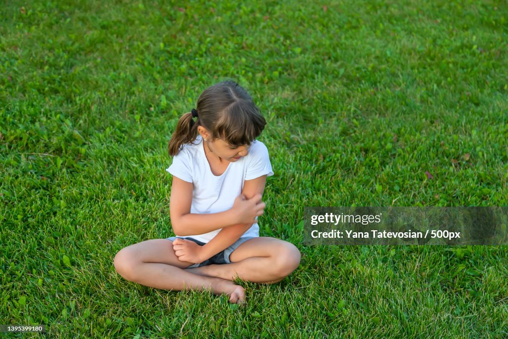 Child is bitten by mosquitoes Selective focus