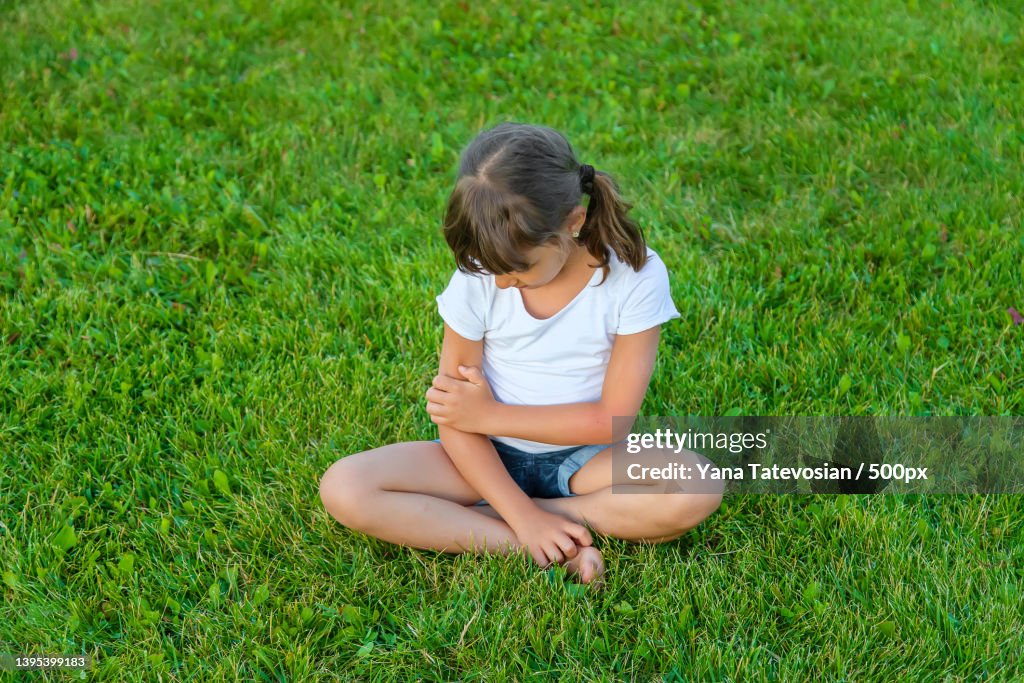 Child is bitten by mosquitoes Selective focus