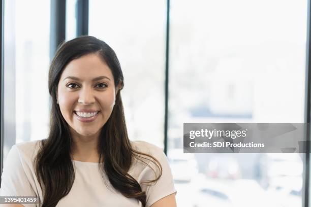 headshot mid adult female professional - banker portrait imagens e fotografias de stock