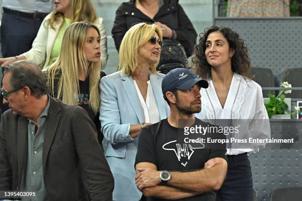 Maribel Nadal, Ana Maria Parera and Xisca Perello attend Rafael Nadal's match against Miomir Kecmanovic at the Mutua Madrid Open on May 4, 2022 in...