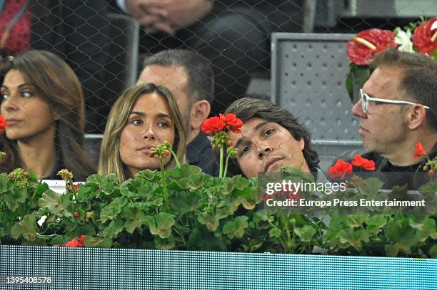 Maria Pombo and Pablo Castellano attend Rafael Nadal's match against Miomir Kecmanovic at the Mutua Madrid Open on May 4, 2022 in Madrid, Spain.