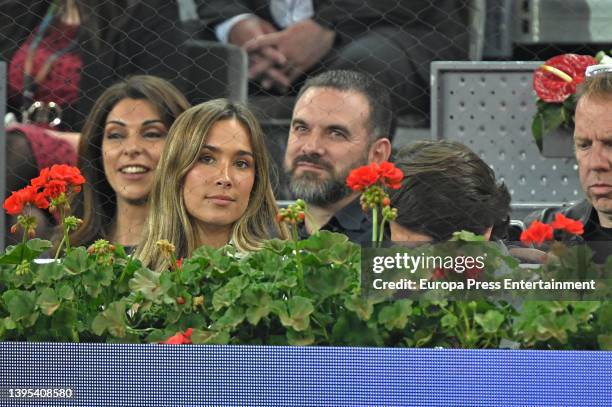 Maria Pombo and Pablo Castellano attend Rafael Nadal's match against Miomir Kecmanovic at the Mutua Madrid Open on May 4, 2022 in Madrid, Spain.