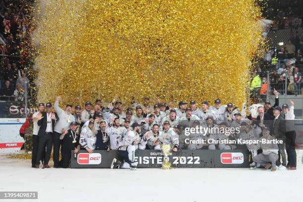 Team of Eisbaeren Berlin celebrates celebrates victory after winning the DEL Playoff Final Game 4 between EHC Red Bull Muenchen and Eisbaeren Berlin...