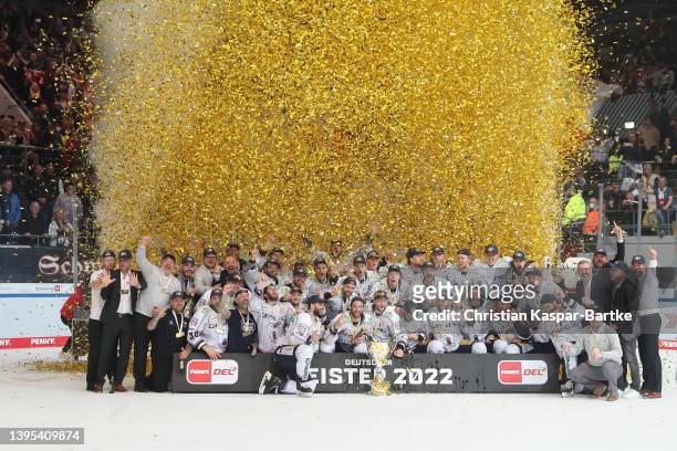 Team of Eisbaeren Berlin celebrates celebrates victory after winning the DEL Playoff Final Game 4 between EHC Red Bull Muenchen and Eisbaeren Berlin...