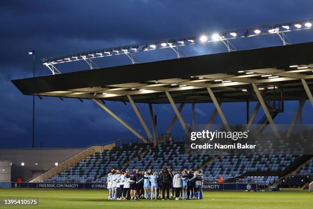 General view inside the stadium as Manchester City huddle after the Barclays FA Women's Super League match between Manchester City Women and...