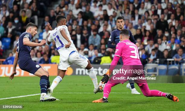 Rodrygo of Real Madrid celebrates after scoring their sides first goal during the UEFA Champions League Semi Final Leg Two match between Real Madrid...