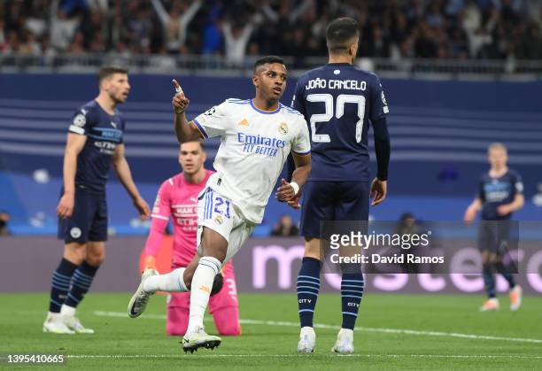 Rodrygo of Real Madrid celebrates after scoring their side's first goal during the UEFA Champions League Semi Final Leg Two match between Real Madrid...