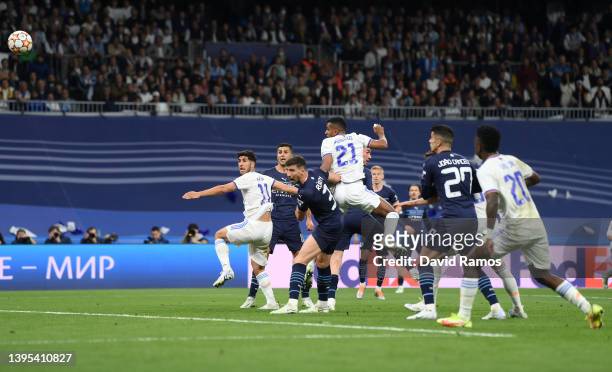 Rodrygo of Real Madrid scores their side's second goal during the UEFA Champions League Semi Final Leg Two match between Real Madrid and Manchester...
