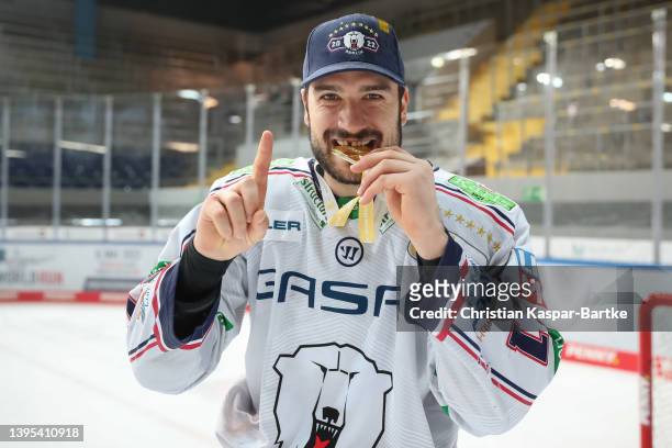 Giovanni Fiore of Eisbaeren Berlin celebrates after winning the DEL Playoff Final Game 4 between EHC Red Bull Muenchen and Eisbaeren Berlin at...