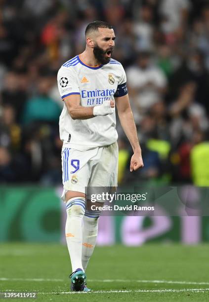 Karim Benzema of Real Madrid celebrates after scoring their side's third goal during the UEFA Champions League Semi Final Leg Two match between Real...
