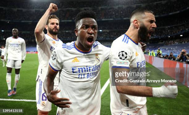 Karim Benzema of Real Madrid celebrates after scoring their side's third goal during the UEFA Champions League Semi Final Leg Two match between Real...
