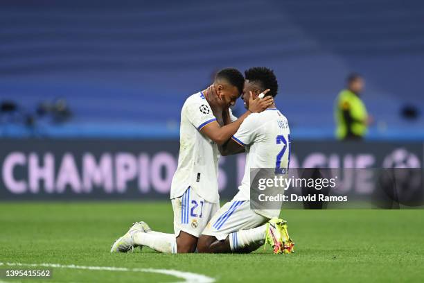 Rodrygo and Vinicius Junior of Real Madrid celebrate their side's victory and progression to the UEFA Champions League Final after the UEFA Champions...