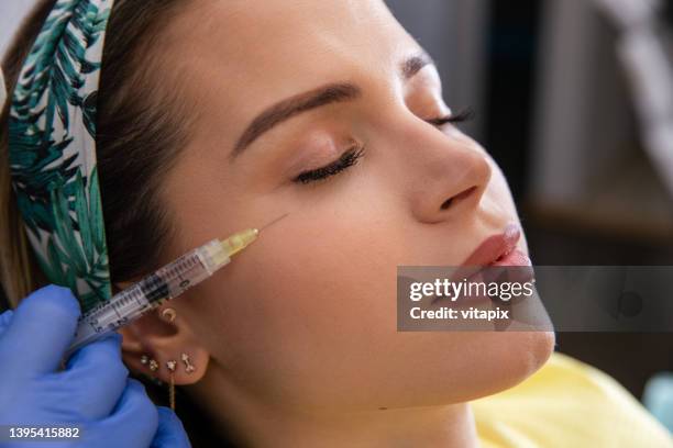 botox treatment - plastic surgery stockfoto's en -beelden