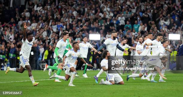 Real Madrid celebrate their side's victory and progression to the UEFA Champions League Final after the UEFA Champions League Semi Final Leg Two...