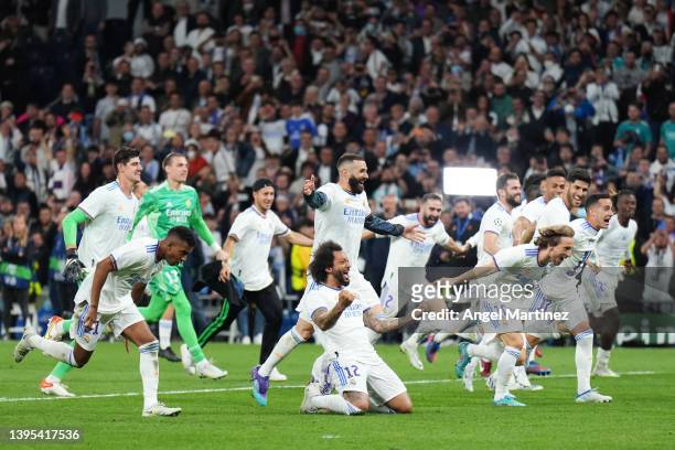 Real Madrid celebrate their side's victory and progression to the UEFA Champions League Final after the UEFA Champions League Semi Final Leg Two...