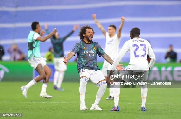 Marcelo and Ferland Mendy of Real Madrid celebrate after the UEFA Champions League Semi Final Leg Two match between Real Madrid and Manchester City...