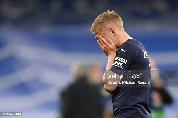 Oleksandr Zinchenko of Manchester City looks dejected following defeat in the UEFA Champions League Semi Final Leg Two match between Real Madrid and...