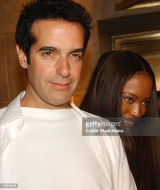Magician David Copperfield and model Naomi Campbell attend the Rosa Cha Bikini Show at Cipriani's restaurant during Mercedes-Benz Fashion Week...