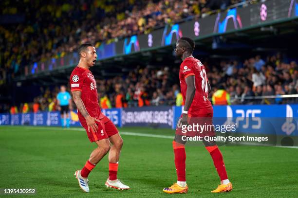 Sadio Mane of Liverpool celebrates with Thiago Alcantara after scoring his team's third goal during the UEFA Champions League Semi Final Leg Two...