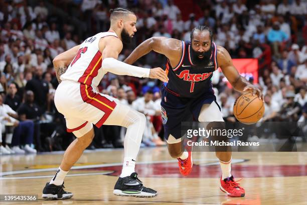 James Harden of the Philadelphia 76ers drives to the basket against Caleb Martin of the Miami Heat during the first half in Game Two of the Eastern...