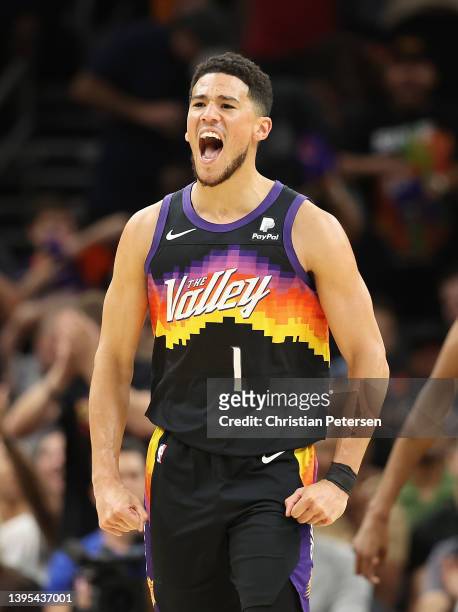Devin Booker of the Phoenix Suns reacts after scoring against the Dallas Mavericks during the first half of Game One of the Western Conference Second...