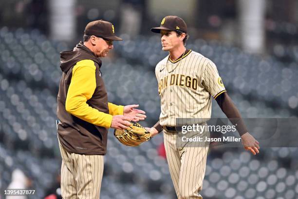 Manager Bob Melvin of the San Diego Padres takes pitcher Tim Hill out of the game in the eighth inning of game two of a doubleheader against the...