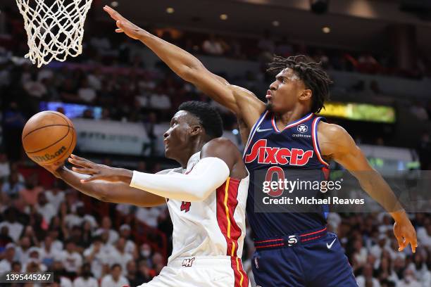 Tyrese Maxey of the Philadelphia 76ers defends a layup by Victor Oladipo of the Miami Heat during the second half in Game Two of the Eastern...