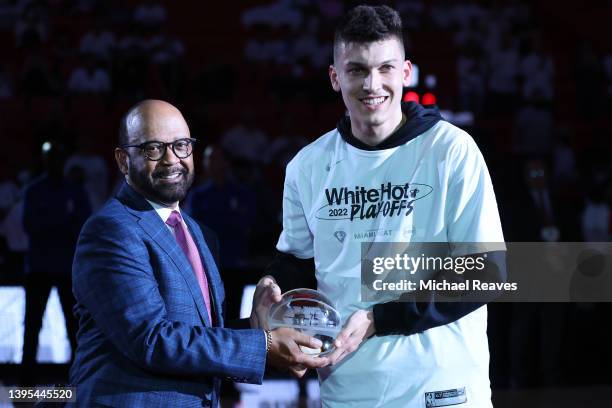 Tyler Herro of the Miami Heat is presented with the NBA Sixth Man of the Year award prior to Game Two of the Eastern Conference Semifinals against...