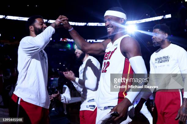 Jimmy Butler of the Miami Heat laughs as he is introduced prior to Game Two of the Eastern Conference Semifinals against the Philadelphia 76ers at...