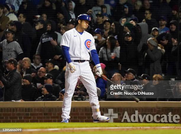Seiya Suzuki of the Chicago Cubs reacts during the eighth inning of a game against the Chicago White Sox at Wrigley Field on May 04, 2022 in Chicago,...