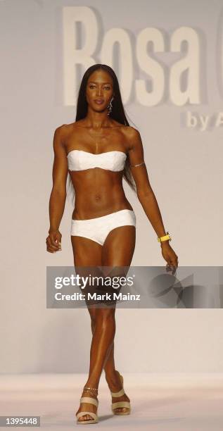 Model Naomi Campbell walks on the runway during the Rosa Cha Bikini Show at Cipriani's restaurant during Mercedes-Benz Fashion Week September 19,...
