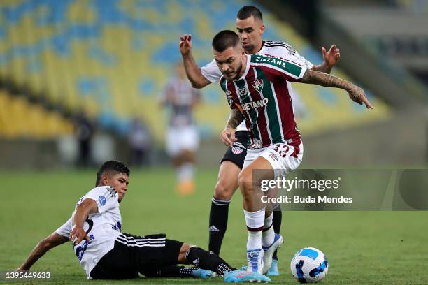 Nathan of Fluminense fights for the ball with Serje of Junior during the match between Fluminense and Junior as part of Copa CONMEBOL Libertadores...