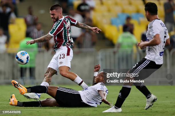 Nathan of Fluminense fights for the ball with Velasco of Junior during the match between Fluminense and Junior as part of Copa CONMEBOL Libertadores...