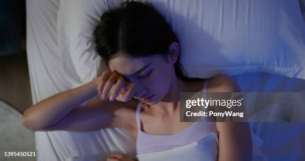 asian woman has insomnia - asian sleeping stock pictures, royalty-free photos & images