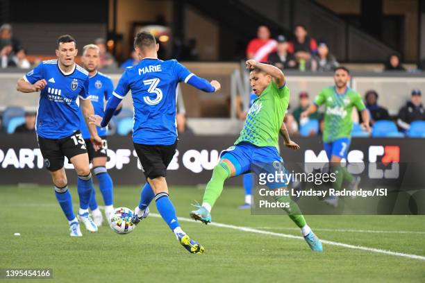 Paul Marie of the San Jose Earthquakes battles for the ball with Raul Ruidiaz of the Seattle Sounders during a game between Seattle Sounders FC and...