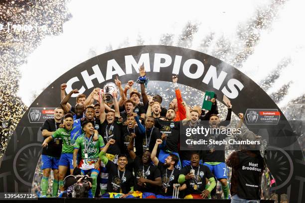 The Seattle Sounders celebrate after beating Pumas 3-0 during 2022 Scotiabank Concacaf Champions League Final Leg 2 at Lumen Field on May 04, 2022 in...