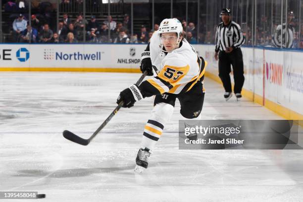 Teddy Blueger of the Pittsburgh Penguins shoots the puck against the New York Rangers in Game One of the First Round of the 2022 Stanley Cup Playoffs...