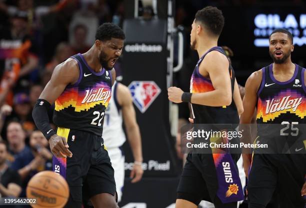 Deandre Ayton of the Phoenix Suns reacts to a slam dunk against the Dallas Mavericks during the first half of Game Two of the Western Conference...