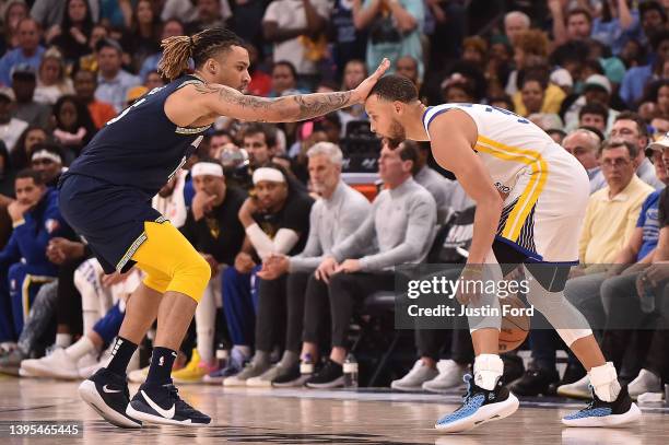 Brandon Clarke of the Memphis Grizzlies guards Stephen Curry of the Golden State Warriors during Game Two of the Western Conference Semifinals of the...