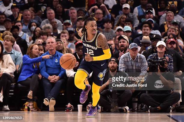 Ja Morant of the Memphis Grizzlies brings the ball up court against the Golden State Warriors during Game Two of the Western Conference Semifinals of...