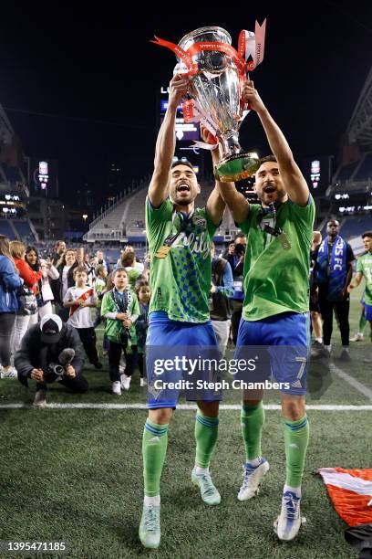 Alex Roldan and Cristian Roldan of Seattle Sounders celebrate after beating Pumas 3-0. During 2022 Scotiabank Concacaf Champions League Final Leg 2...