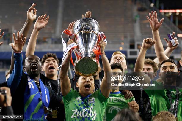 The Seattle Sounders celebrate after beating Pumas 3-0 during 2022 Scotiabank Concacaf Champions League Final Leg 2 at Lumen Field on May 04, 2022 in...