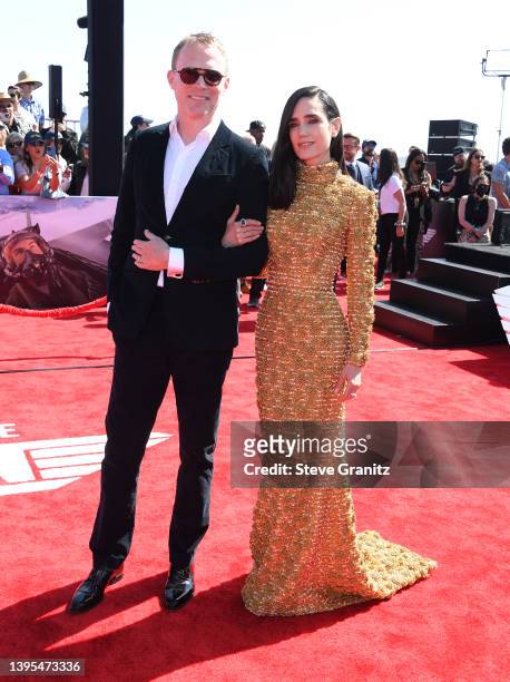 Paul Bettany and Jennifer Connelly arrives at the "Top Gun: Maverick" World Premiere on May 04, 2022 in San Diego, California.