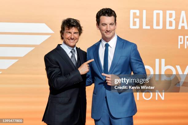 Tom Cruise and Miles Teller attend the Global Premiere of "Top Gun: Maverick" on May 04, 2022 in San Diego, California.