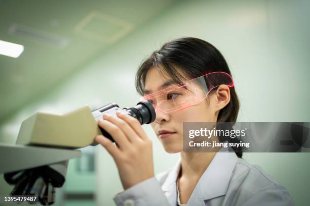 4,316 Asian Woman Microscope Stock Photos, High-Res Pictures, and ...
